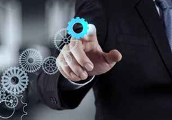 picture of man pointing to drawn gears